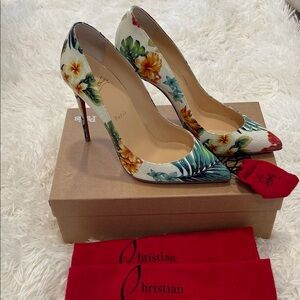 Christian Louboutin Pigalle Follies 100 heels in 38.5. Tropical pattern.